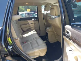 2014 Jeep Grand Cherokee Limited with VIN 1C4RJEBM2EC300212, listed as a IAAI auction lot 39498423 with 99,938 mi miles. Bid and sale history available at carsss.com. Image 8.