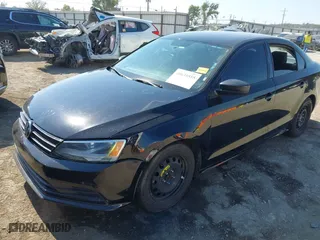 2015 Volkswagen Jetta Sedan 2.0L S with VIN 3VW2K7AJ9FM322125, listed as a IAAI auction lot 40635555 with 114,409 mi miles. Bid and sale history available at carsss.com. Image 18.