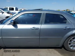 2006 Chrysler 300 C with VIN 2C3KA63H56H313967, listed as a IAAI auction lot 42056998 with 143,592 mi miles and . Bid and sale history available at carsss.com. Image 14.