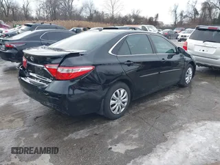 2016 Toyota Camry XSE with VIN 4T1BK1FKXGU030459, listed as a IAAI auction lot 41249705 with 190,531 mi miles. Bid and sale history available at carsss.com. Image 4.