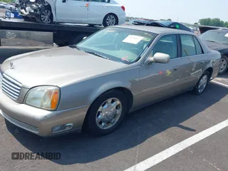 2002 Cadillac DeVille z VIN 1G6KD54Y12U219770, wystawiony jako IAAI lot #42474317 z przebiegiem 122 776 mil mil oraz . Historia ofert i sprzedaży dostępna na DreamBid. Obrazek 2.