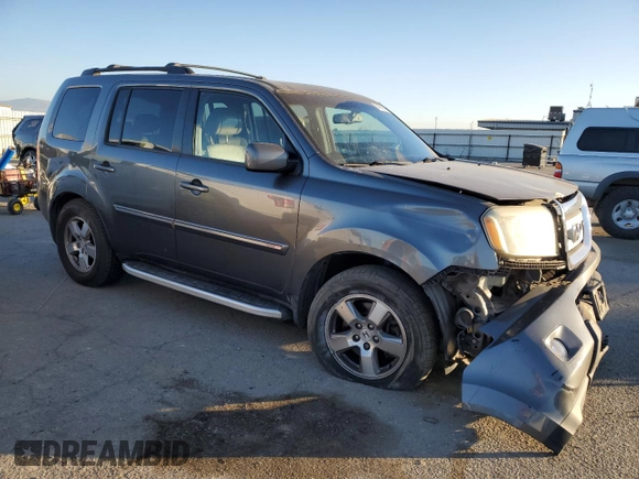 2011 Honda Pilot EX-L with VIN 5FNYF3H72BB008965, listed as a Copart auction lot 88961845 with 128,443 mi miles and Salvage Title. Bid and sale history available at DreamBid. Image 4.