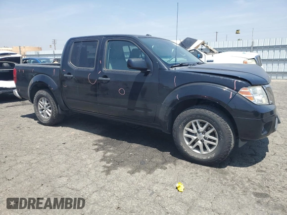 2015 Nissan Frontier SV with VIN 1N6AD0ER4FN767942, listed as a Copart auction lot 60911325 with 118,611 mi miles and Salvage title. Bid and sale history available at DreamBid. Image 4.