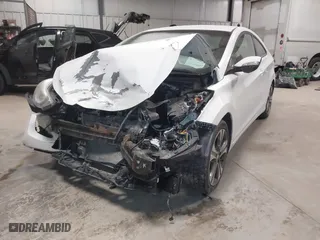2014 Hyundai Elantra Coupe with VIN KMHDH6AH7EU026513, listed as a IAAI auction lot 41389603 with 146,885 mi miles. Bid and sale history available at carsss.com. Image 17.