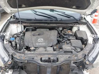 2014 Mazda CX-5 Sport with VIN JM3KE2BE8E0422322, listed as a IAAI auction lot 42009499 with 166,966 mi miles and . Bid and sale history available at carsss.com. Image 10.