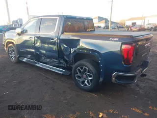 2023 GMC Sierra 1500 SLT z VIN 3GTUUDE89PG263119, wystawiony jako IAAI lot #41455629 z przebiegiem 25 629 mil mil oraz . Historia ofert i sprzedaży dostępna na DreamBid. Obrazek 3.