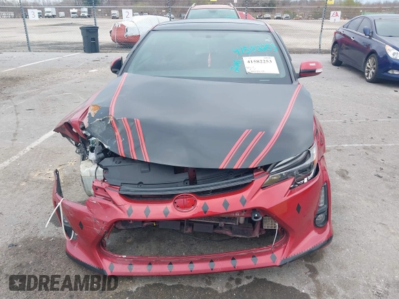 2016 Scion tC with VIN JTKJF5C74GJ026588, listed as a IAAI auction lot 41582253 with 74,023 mi miles. Bid and sale history available at carsss.com. Image 12.