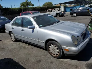 1999 Mercedes-Benz E-Class with VIN WDBJF65H3XA882627, listed as a Copart auction lot 72476674 with 187,656 mi miles and Salvage Title. Bid and sale history available at carsss.com. Image 4.