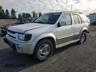 1998 Infiniti QX4 with VIN JNRAR05Y9WW027079, listed as a Copart auction lot 72374434 with 206,587 mi miles and Salvage Title. Bid and sale history available at DreamBid. Image 1.