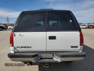 1999 GMC Yukon with VIN 1GKEK13R4XJ751482, listed as a Copart auction lot 48035075 with 154,800 mi miles and Salvage Title. Bid and sale history available at carsss.com. Image 6.