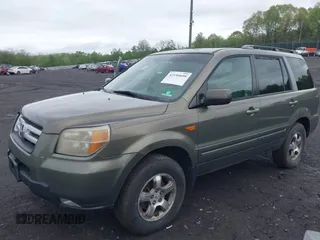 2007 Honda Pilot EX-L with VIN 2HKYF18557H507206, listed as a IAAI auction lot 42195899 with 284,784 mi miles. Bid and sale history available at carsss.com. Image 2.