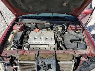 2000 Cadillac Seville Luxury SLS z VIN 1G6KS54Y3YU247875, wystawiony jako Copart lot #74712414 z przebiegiem 148 910 mil mil oraz Szkoda całkowita • Salvage title. Historia ofert i sprzedaży dostępna na DreamBid. Obrazek 11.