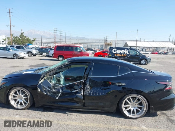 2019 Nissan Maxima SV with VIN 1N4AA6AV0KC379040, listed as a IAAI auction lot 42003805 with 53,724 mi miles and . Bid and sale history available at DreamBid. Image 14.