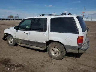 2000 Ford Explorer XLT with VIN 1FMZU83PXYZA71034, listed as a Copart auction lot 55447585 with 175,118 mi miles and Salvage title. Bid and sale history available at DreamBid. Image 2.
