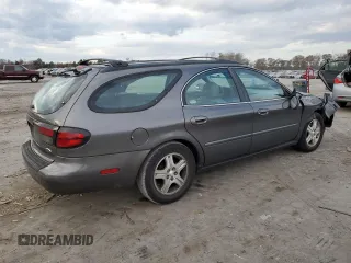2002 Ford Taurus with VIN 1FAFP59S62A256119, listed as a Copart auction lot 79581164 with 57,128 mi miles and Clean title. Bid and sale history available at DreamBid. Image 3.