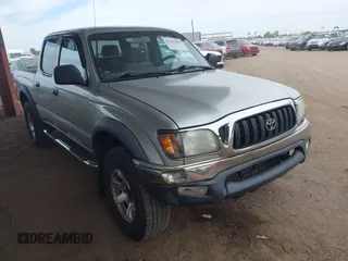 2001 Toyota Tacoma z VIN 5TEHN72N71Z809339, wystawiony jako IAAI lot #42361626 z przebiegiem 158 490 mil mil oraz . Historia ofert i sprzedaży dostępna na DreamBid. Obrazek 1.