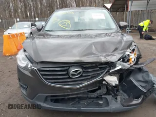 2016 Mazda CX-5 Sport with VIN JM3KE4BY8G0895209, listed as a IAAI auction lot 41688405 with 115,954 mi miles. Bid and sale history available at carsss.com. Image 12.