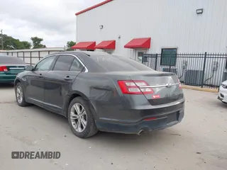 2015 Ford Taurus SEL with VIN 1FAHP2E8XFG161616, listed as a IAAI auction lot 42049199 with 138,565 mi miles and . Bid and sale history available at carsss.com. Image 14.