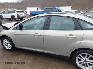 2015 Ford Focus SE with VIN 1FADP3F26FL299112, listed as a IAAI auction lot 41492446 with 57,103 mi miles. Bid and sale history available at carsss.com. Image 15.