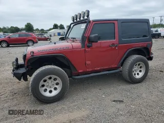 2012 Jeep Wrangler Sport with VIN 1C4AJWAG7CL105511, listed as a Copart auction lot 62822985 with 137,520 mi miles and Clean title. Bid and sale history available at DreamBid. Image 1.