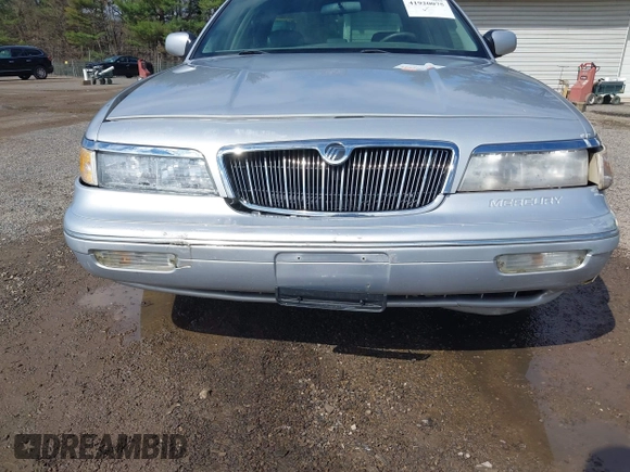1997 Mercury Grand Marquis LS with VIN 2MELM75W3VX717801, listed as a IAAI auction lot 41920075 with 173,730 mi miles and . Bid and sale history available at DreamBid. Image 6.
