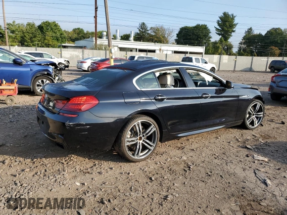 2013 BMW 6 Series 650i xDrive with VIN WBA6B4C57DDG67584, listed as a Copart auction lot 70319464 with 0 mi miles and Salvage Title. Bid and sale history available at carsss.com. Image 3.