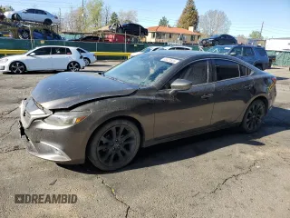 2016 Mazda 6 i Grand Touring с VIN JM1GJ1W52G1435630, выставлен на аукционе Copart как лот 55321655 с пробегом 94 187 миль миль и Списание • Salvage title. История ставок и продаж доступна на DreamBid. Изображение 1.