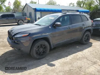 2017 Jeep Cherokee Trailhawk with VIN 1C4PJMBS0HW589626, listed as a Copart auction lot 53981435 with 105,318 mi miles and Salvage title. Bid and sale history available at DreamBid. Image 1.