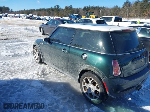 2003 MINI Hardtop S z VIN WMWRE33473TD72981, wystawiony jako IAAI lot #41599521 z przebiegiem 97 403 mil mil oraz . Historia ofert i sprzedaży dostępna na DreamBid. Obrazek 15.