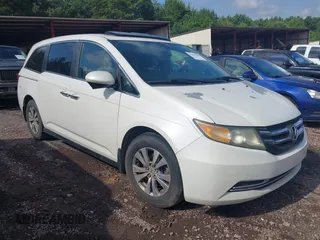 2014 Honda Odyssey EX-L with VIN 5FNRL5H65EB009015, listed as a IAAI auction lot 42603443 with 295,611 mi miles and . Bid and sale history available at DreamBid. Image 1.