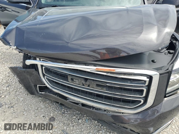 2015 GMC Yukon XL SLE z VIN 1GKS1GKC2FR625157, wystawiony jako Copart lot #69628124 z przebiegiem 153 022 mil mil oraz Szkoda całkowita • Salvage title. Historia ofert i sprzedaży dostępna na DreamBid. Obrazek 12.