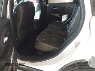 2018 Jeep Cherokee Trailhawk with VIN 1C4PJMBX7JD550173, listed as a IAAI auction lot 41094306 with 74,128 mi miles. Bid and sale history available at carsss.com. Image 8.