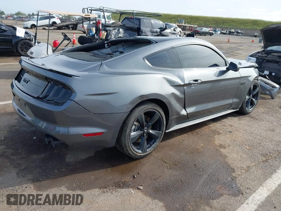 2022 Ford Mustang GT with VIN 1FA6P8CF2N5131421, listed as a IAAI auction lot 42047492 with 21,376 mi miles and . Bid and sale history available at DreamBid. Image 4.