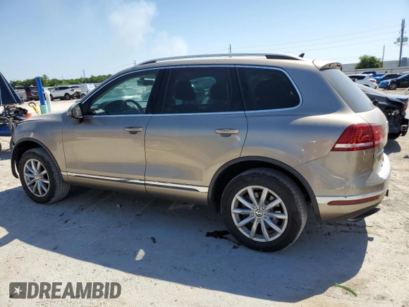2016 Volkswagen Touareg Sport with VIN WVGEF9BP1GD006147, listed as a Copart auction lot 53247765 with 7,842 mi miles and Salvage Title. Bid and sale history available at DreamBid. Image 2.