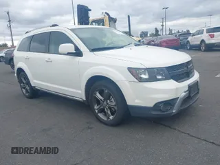 2015 Dodge Journey Crossroad with VIN 3C4PDCGG4FT697773, listed as a IAAI auction lot 41730507 with 151,247 mi miles and . Bid and sale history available at DreamBid. Image 1.