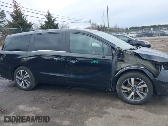 2023 Honda Odyssey Touring with VIN 5FNRL6H81PB068721, listed as a IAAI auction lot 41489618 with 20,202 mi miles and . Bid and sale history available at DreamBid. Image 14.