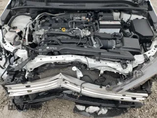 2023 Toyota Corolla LE z VIN JTDB4MEE6PJ003126, wystawiony jako Copart lot #44764655 z przebiegiem 23 867 mil mil oraz Szkoda całkowita • Salvage title. Historia ofert i sprzedaży dostępna na DreamBid. Obrazek 11.