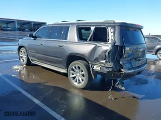 2017 Chevrolet Suburban Premier with VIN 1GNSKJKC0HR274605, listed as a IAAI auction lot 41828392 with 144,747 mi miles. Bid and sale history available at carsss.com. Image 3.