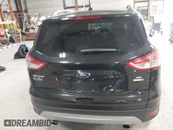 2015 Ford Escape SE with VIN 1FMCU9G97FUA21287, listed as a IAAI auction lot 41990144 with 55,036 mi miles and . Bid and sale history available at DreamBid. Image 17.