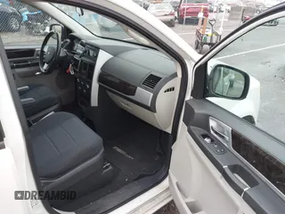 2010 Dodge Grand Caravan SXT with VIN 2D4RN5D1XAR191011, listed as a IAAI auction lot 41162015 with 83,251 mi miles and . Bid and sale history available at DreamBid. Image 5.