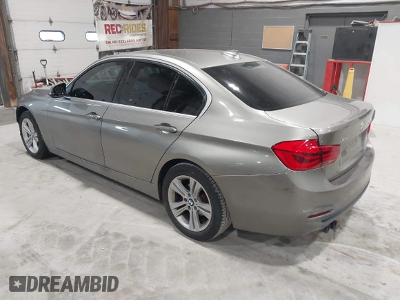 2017 BMW 3 Series 330i xDrive with VIN WBA8D9C32HA011795, listed as a IAAI auction lot 41789050 with 65,522 mi miles and . Bid and sale history available at DreamBid. Image 3.