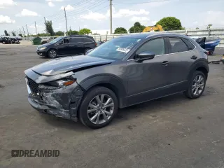2021 Mazda CX-30 Premium with VIN 3MVDMADM5MM228960, listed as a Copart auction lot 58986525 with 62,125 mi miles and Salvage title. Bid and sale history available at DreamBid. Image 1.