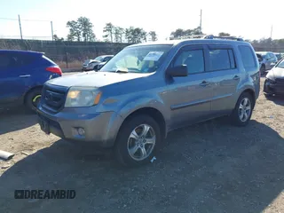 2009 Honda Pilot EX-L with VIN 5FNYF48569B025993, listed as a IAAI auction lot 41746444 with 194,539 mi miles. Bid and sale history available at carsss.com. Image 2.