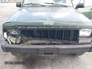 1996 Jeep Cherokee Sport with VIN 1J4FJ68S1TL204870, listed as a IAAI auction lot 41726962 with 93,462 mi miles. Bid and sale history available at carsss.com. Image 6.
