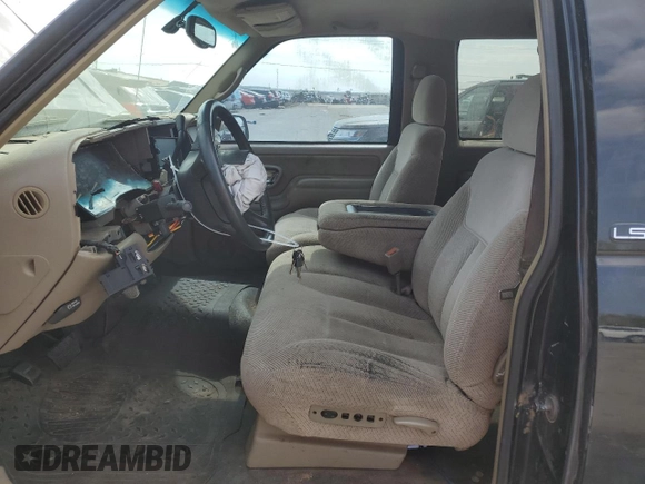 1999 Chevrolet Tahoe z VIN 3GNEC18R3XG165012, wystawiony jako Copart lot #75803204 z przebiegiem 227 608 mil mil oraz Szkoda całkowita • Salvage title. Historia ofert i sprzedaży dostępna na DreamBid. Obrazek 7.