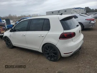 2012 Volkswagen GTI с VIN WVWHV7AJ6CW137871, выставлен на аукционе Copart как лот 52396575 с пробегом 246 663 миль миль и Списание • Salvage title. История ставок и продаж доступна на DreamBid. Изображение 2.
