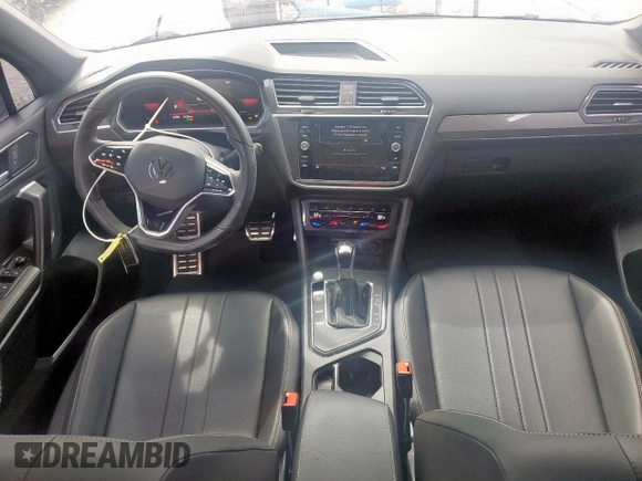 2023 Volkswagen Tiguan SE R-Line Black with VIN 3VVCB7AX5PM128335, listed as a Copart auction lot 56128305 with 21,524 mi miles and Salvage title. Bid and sale history available at DreamBid. Image 8.