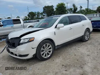 2014 Lincoln MKT with VIN 2LMHJ5FK5EBL57377, listed as a Copart auction lot 70608694 with 115,053 mi miles and Salvage Title. Bid and sale history available at DreamBid. Image 1.