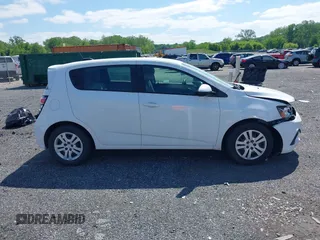 2020 Chevrolet Sonic LT z VIN 1G1JG6SBXL4112344, wystawiony jako IAAI lot #42197358 z przebiegiem 89 720 mil mil oraz . Historia ofert i sprzedaży dostępna na DreamBid. Obrazek 13.