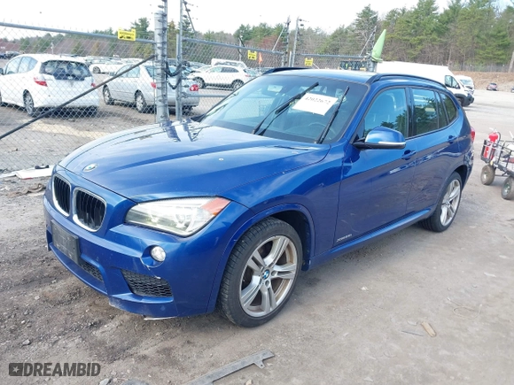 2014 BMW X1 xDrive28i with VIN WBAVL1C58EVY24491, listed as a IAAI auction lot 42022672 with 115,123 mi miles. Bid and sale history available at carsss.com. Image 2.
